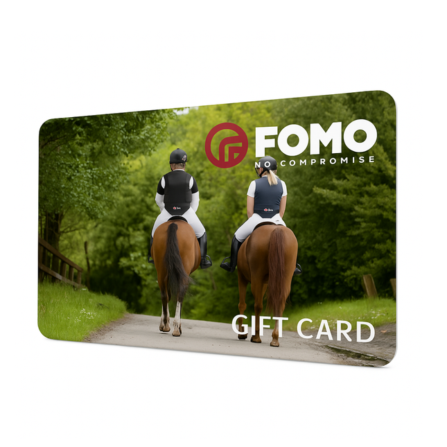FOMO gift card with two people riding horses on a path in a forest