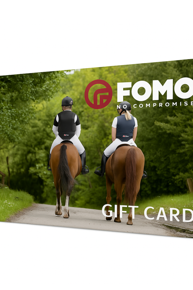 FOMO gift card with two people riding horses on a path in a forest